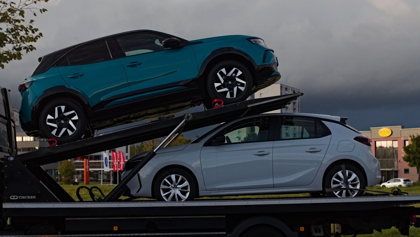 Cars securely loaded on a professional car carrier truck